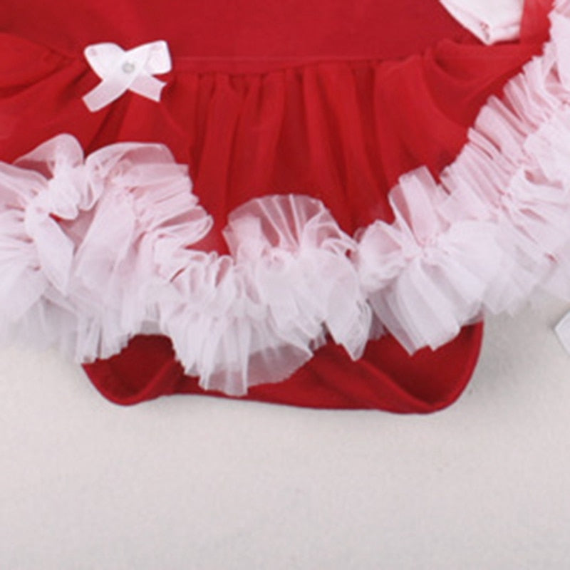 Adorable Four-Piece Christmas Romper Ensemble. Includes Romper, Socks, Shoes, and Head Bow