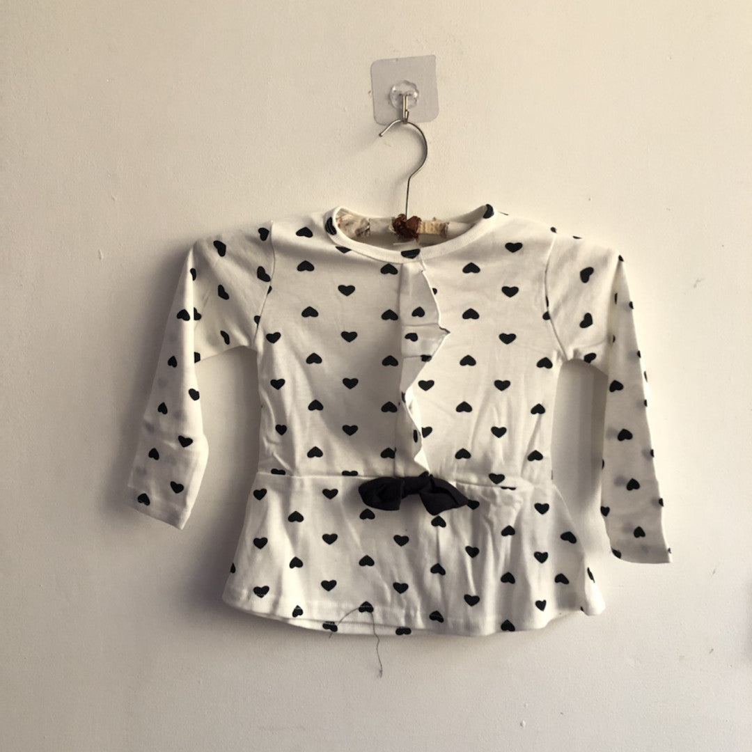 Two-Piece Pants and Shirt Ensemble with Heart Pattern and Bow Detail on the Front of the Shirt